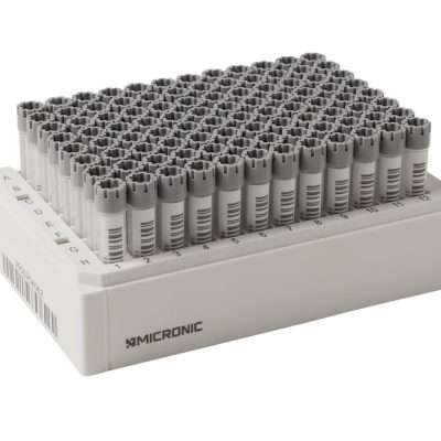 An uncovered rack of 1.40ml externally threaded hybrid tubes with human readable codes and 1D side barcodes precapped with grey screw caps