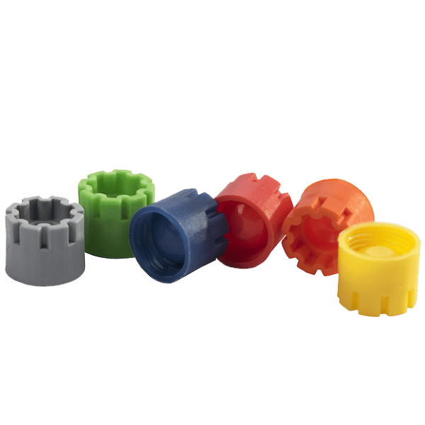 The color range of Micronic's externally threaded screw caps: grey, light green, blue, red, orange, yellow