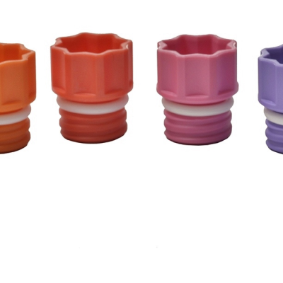 The range of Micronic's internally threaded screw caps: black, grey, white, yellow, orange, red, pink, purple, blue, light blue, light green, and green respectively